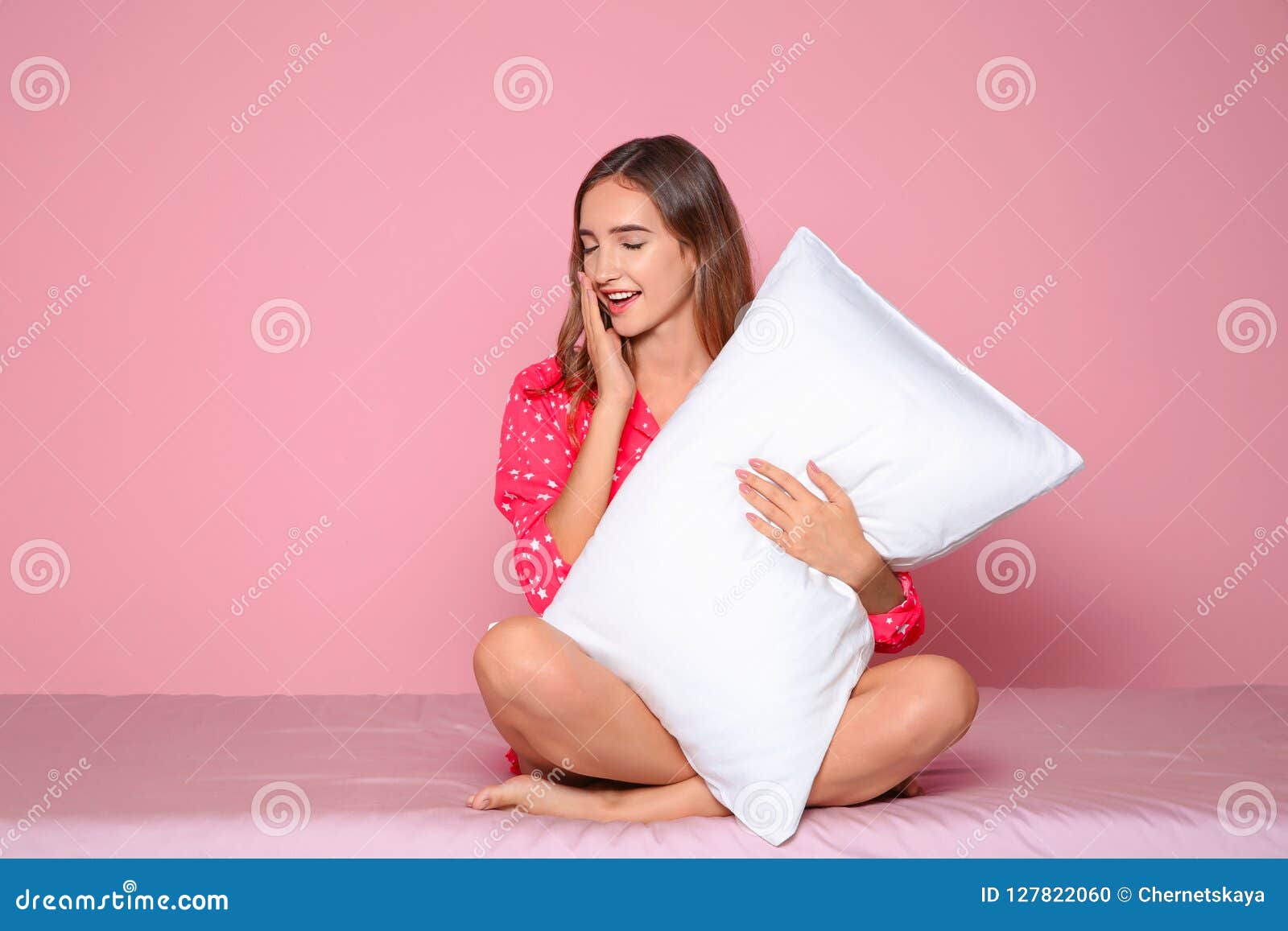 Beautiful Teen Girl Hugging Pillow On Bed Stock Photo I