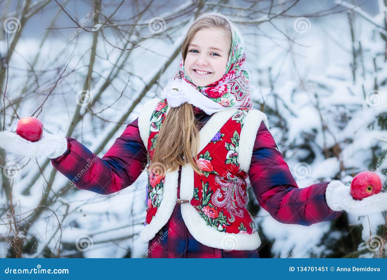 Beautiful Teen Girl In Russian National Clothes With Red Apples In Winter Hands Stock Image