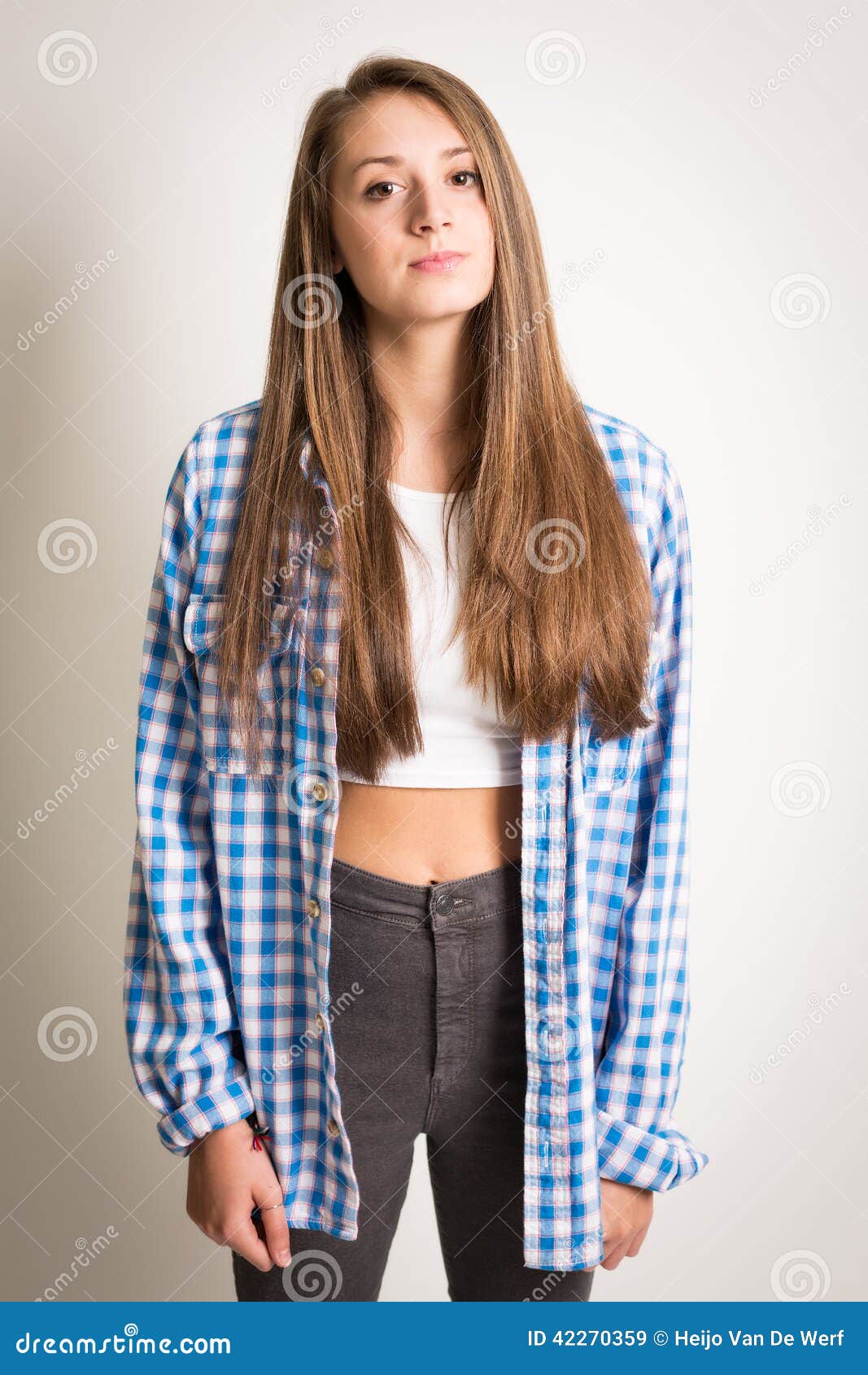 Beautiful Teen Girl In A White Top And Blue Shirt Stock Image