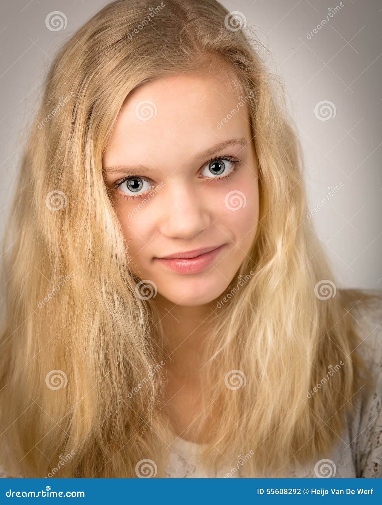 Beautiful Blond Teenage Girl Looking In The Camera Royalty