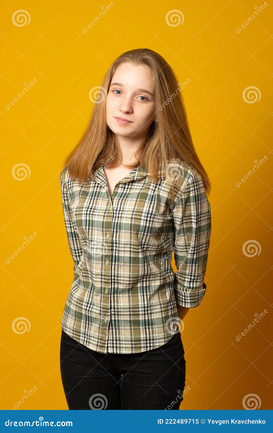 Beautiful Teenage Girl, with a Cute Smile, in Jeans and a Plaid Shirt ...