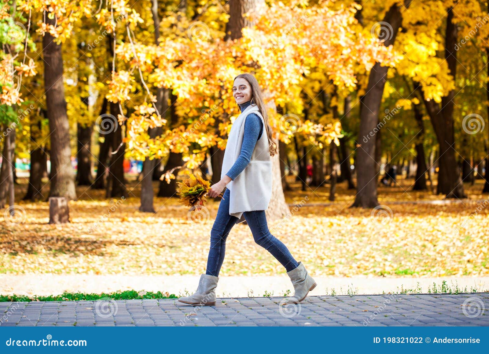 Blonde Teenage Girl Posing in Autumn Park Stock Photo - Image of full ...