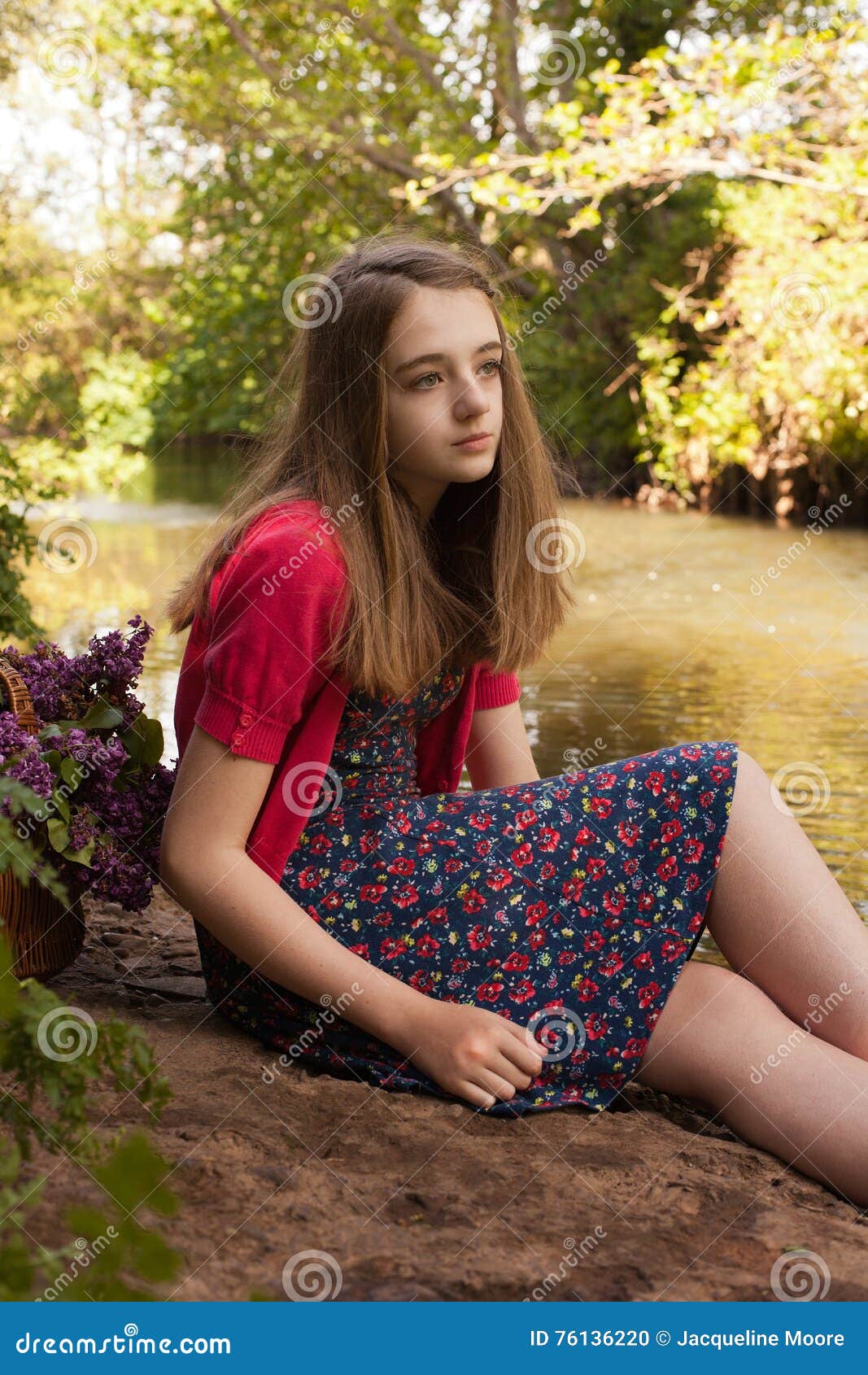 Beautiful Teenage Girl Sitting beside a River Stock Photo - Image of ...