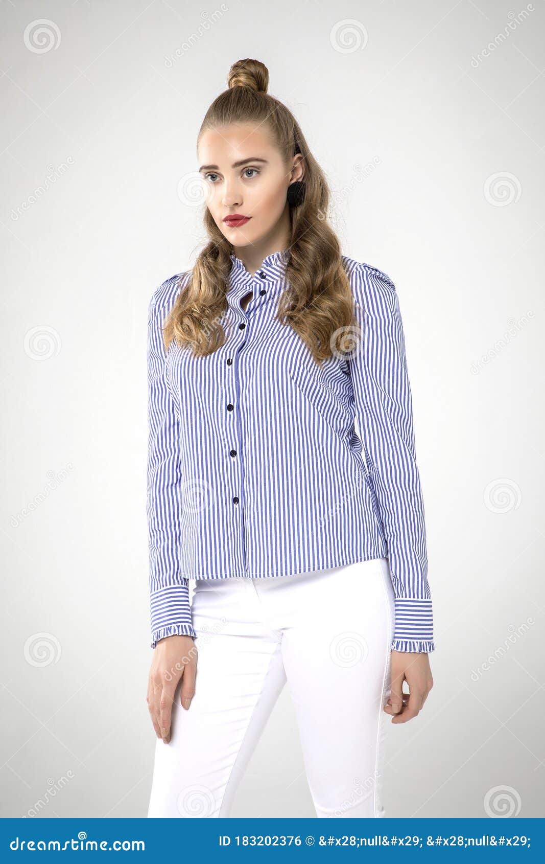 Beautiful Teenage Model In Stylish Blue Striped Shirt And