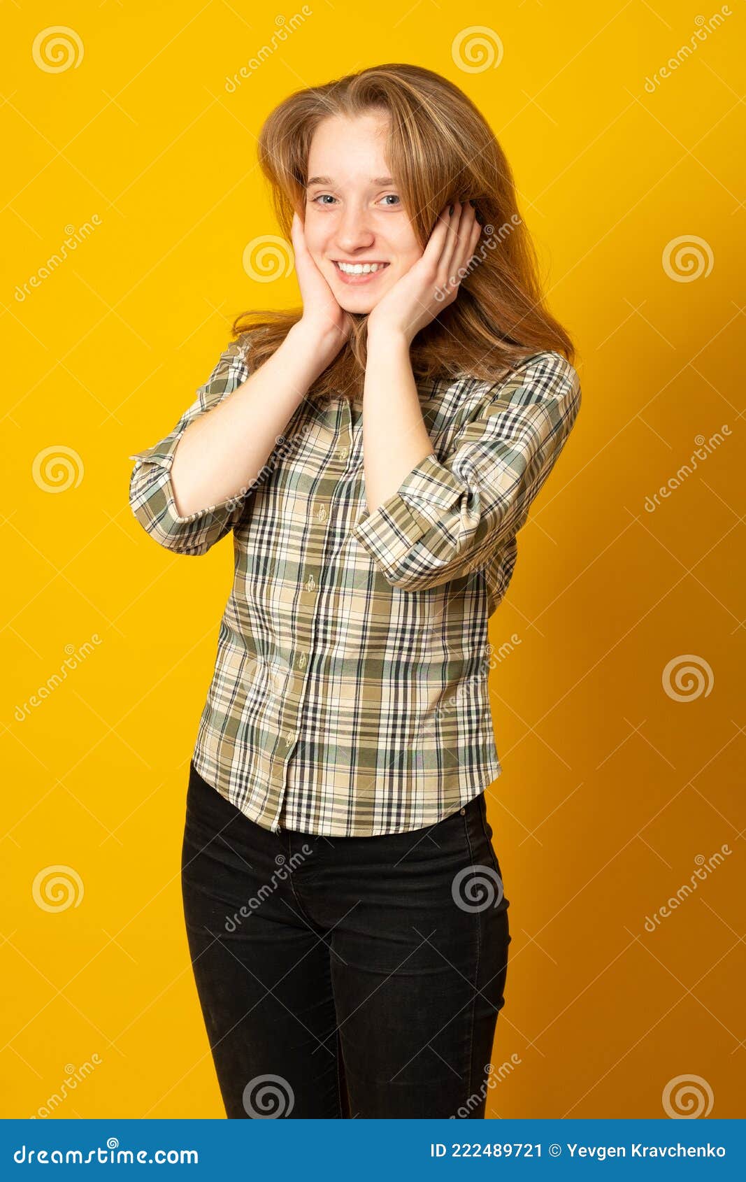 Beautiful Teenager Girl, with a Cute Smile, in Jeans and a Plaid Shirt ...