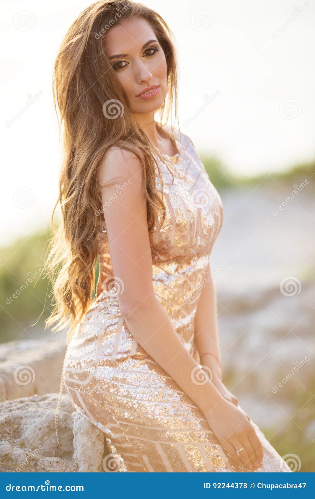 Beautiful Tender Woman Posing On The Sunset Beach Stock