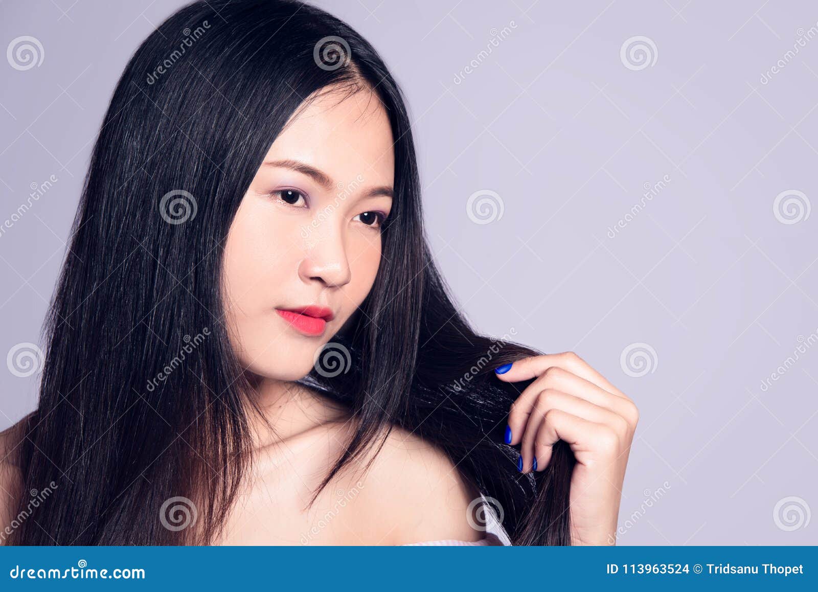 https://thumbs.dreamstime.com/z/beautiful-thai-model-isolated-white-background-model-holding-hair-113963524.jpg