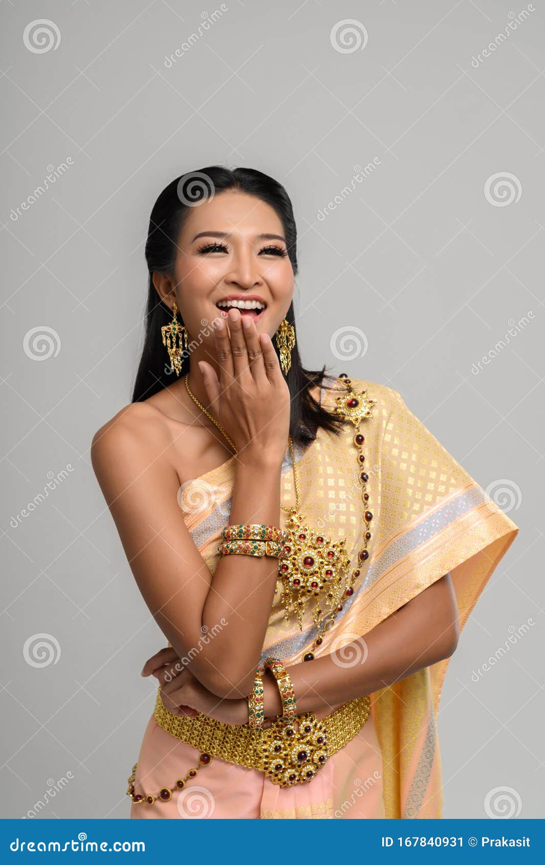 Beautiful Thai Woman Wearing A Thai Dress And A Happy Smile Stock Image