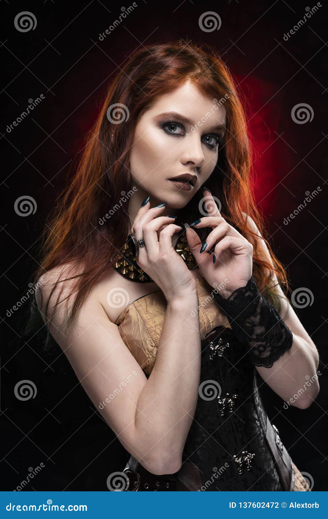 A Beautiful Thoughtful Redhead Cosplay Girl Wearing A Victorian Style Steampunk Dress And Corset