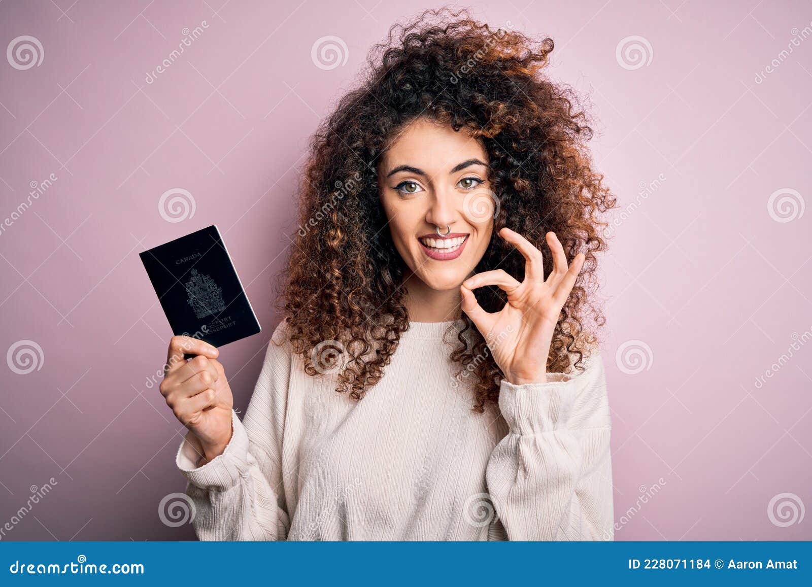 Beautiful Tourist Woman With Curly Hair And Piercing Holding Canada Canadian Passport Id Doing