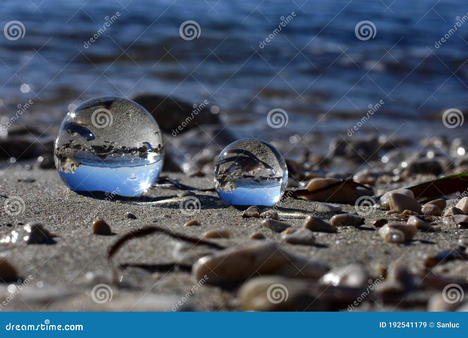 Beautiful Transparent Glass Balls at the Beach Stock Image - Image of  horizon, ball: 192541179