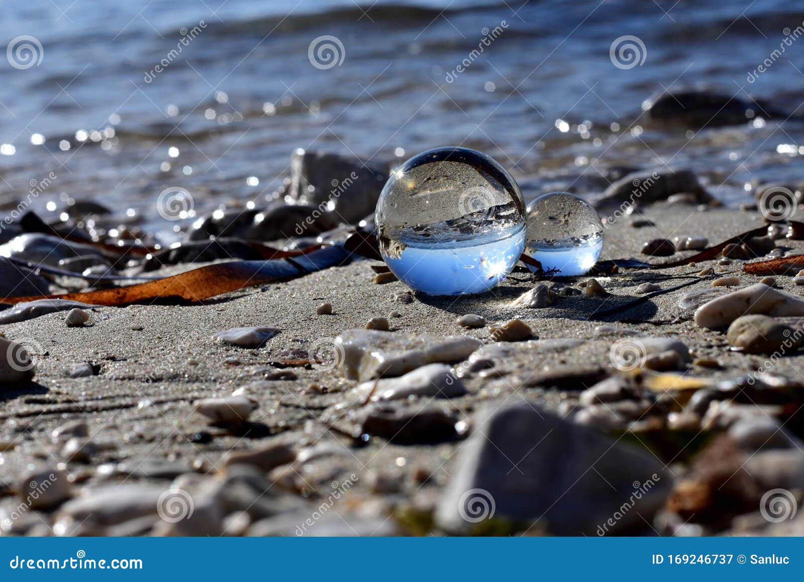 Beautiful Transparent Glass Balls at the Beach Flips the View Upside Down/  Beautiful Landscape Nature Photography Stock Image - Image of beautiful,  closeup: 169246737