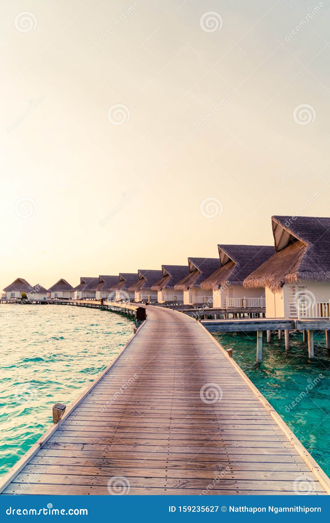 Beautiful Tropical Sunset Over Maldives Island With Water Bungalow In