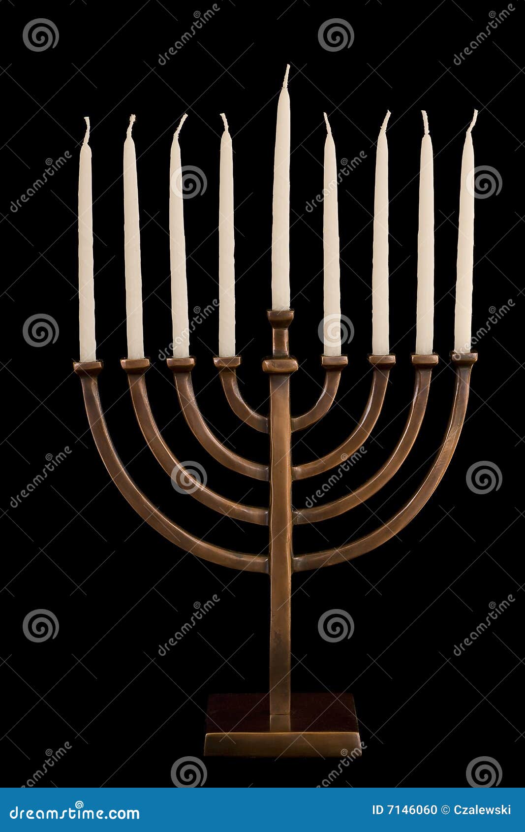 beautiful unlit hanukkah menorah on black velvet.