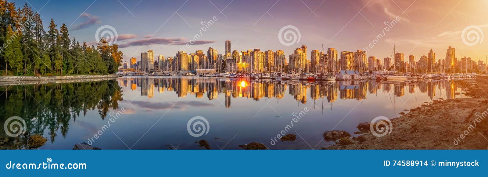 beautiful vancouver skyline and harbor with idyllic sunset glow, british columbia, canada