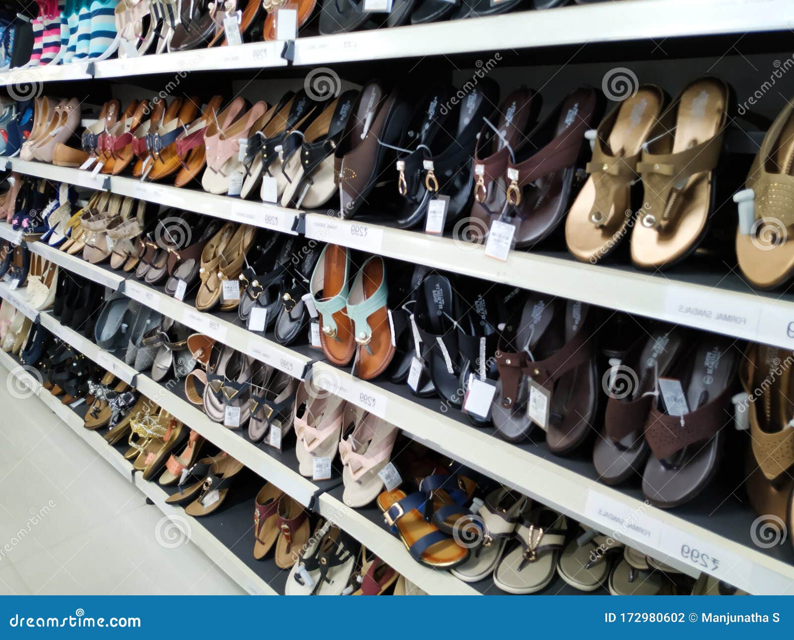 Beautiful View of Adult Slippers Hanging in a Slipper Stand at the ...