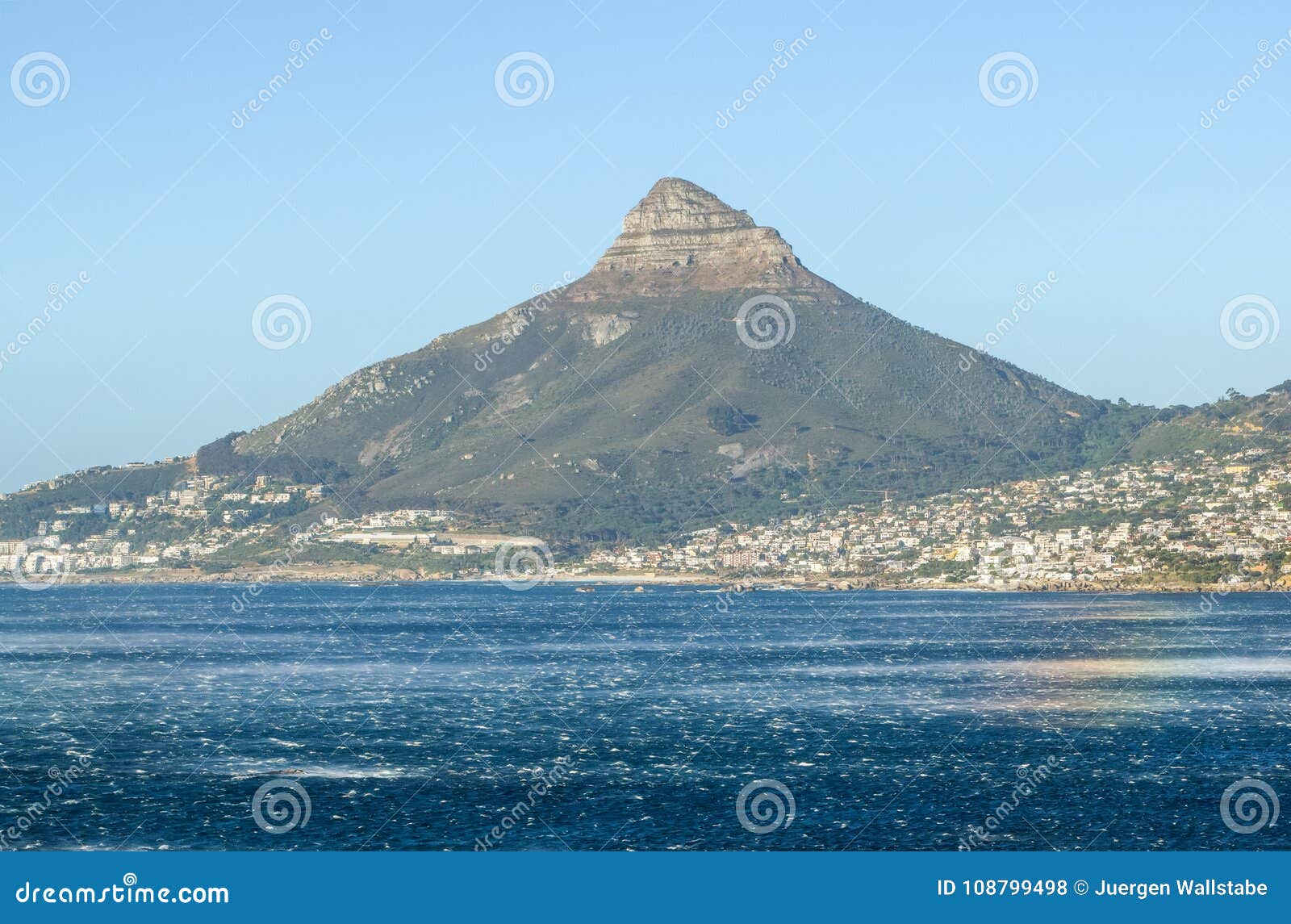 beautiful view of the affluent towns of camps bay and clifton beach, both parts of cape town