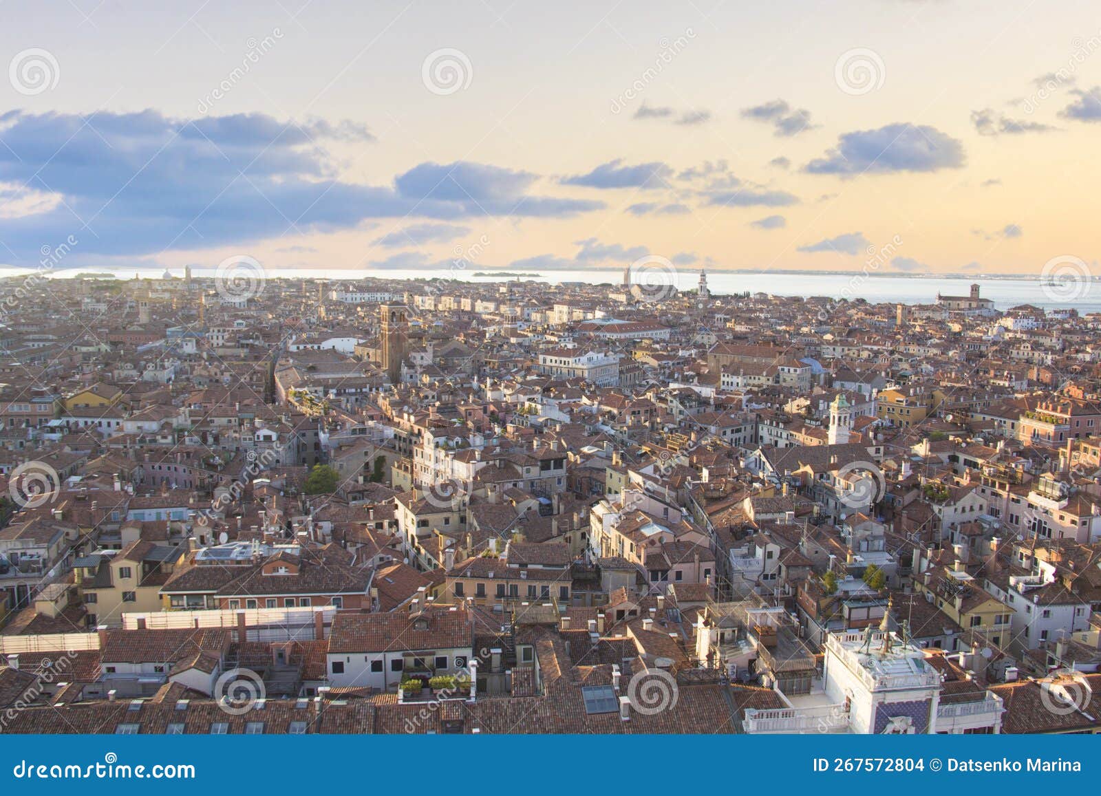 beautiful view from the bell tower of the campanella to the museum correr and the panorama of the city in venice