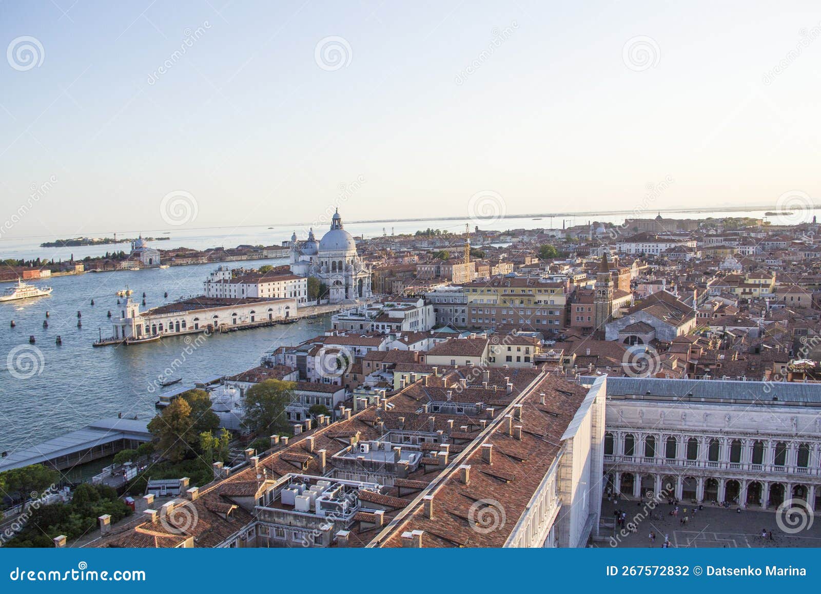 beautiful view from the bell tower of the campanella to the museum correr and the panorama of the city in venice