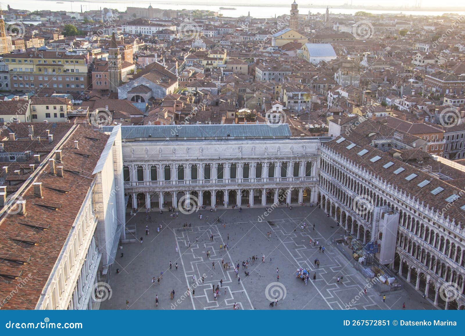 beautiful view from the bell tower of the campanella to the museum correr and the panorama of the city in venice