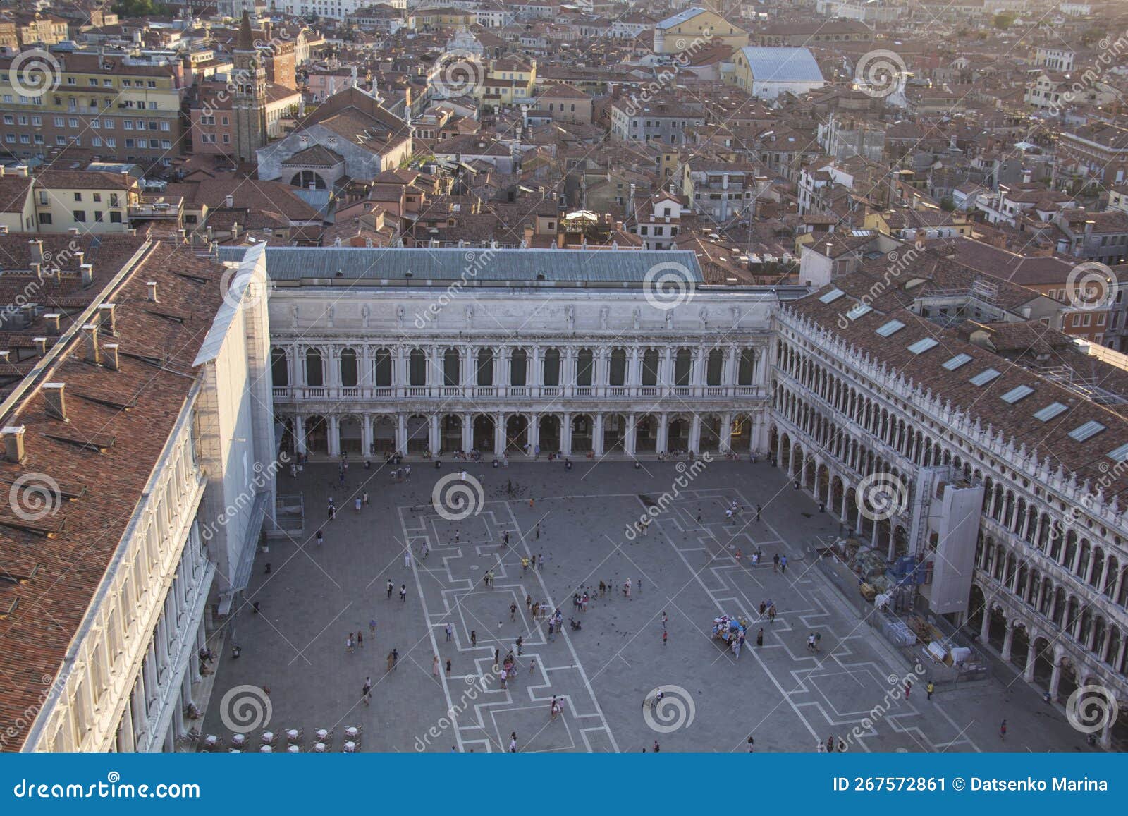 beautiful view from the bell tower of the campanella to the museum correr and the panorama of the city in venice