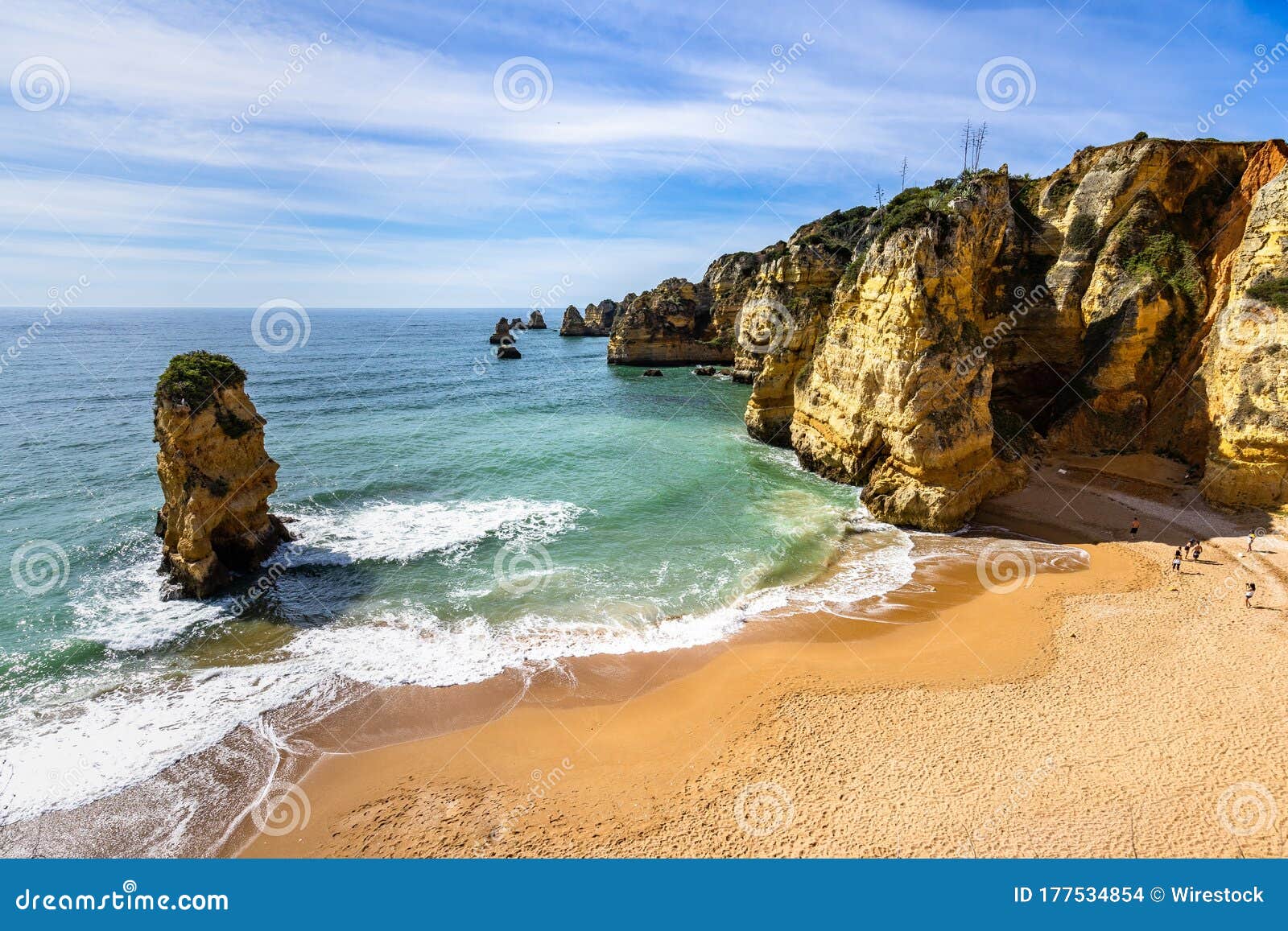 beautiful view of the cliffs and the sea of praia dos estudiantes in algarve, portugal