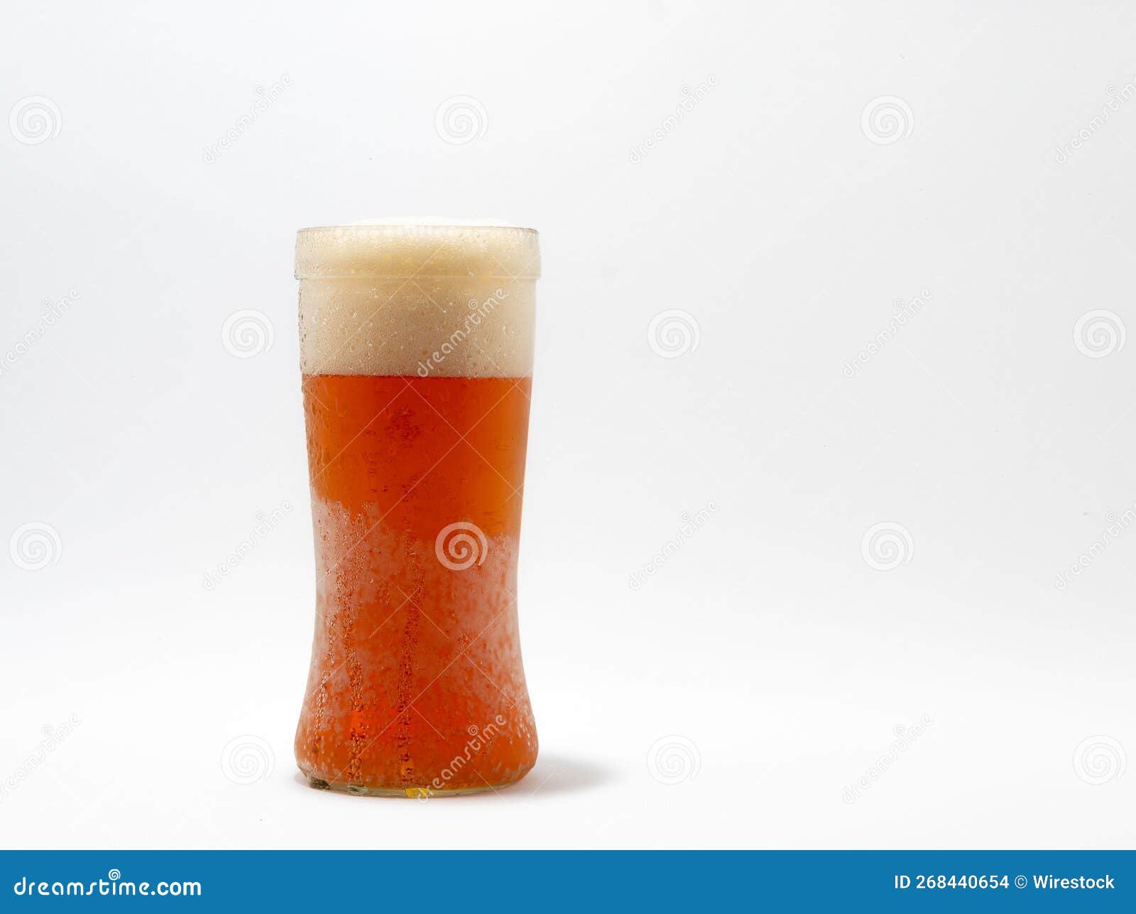 Glass With A Cooling Drink Of Berries And Ice. Misted Glass. Air