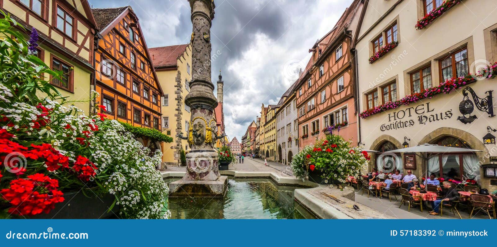 beautiful view of the historic town of rothenburg ob der tauber with fountain, franconia, bavaria, germany