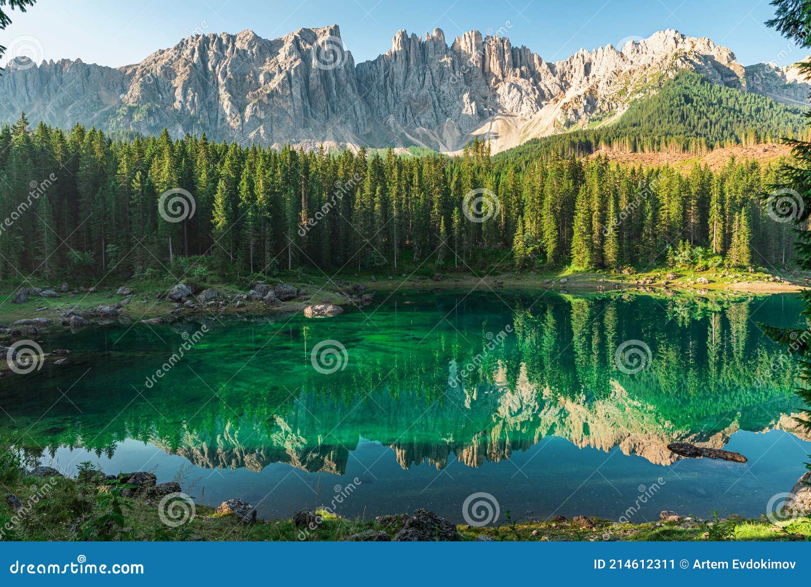 beautiful view on lago di carezza lake or karersee with mountains reflection in italian dolomites alps, italy