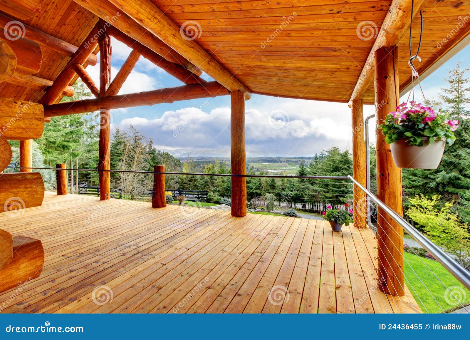 beautiful view of the log cabin house porch.