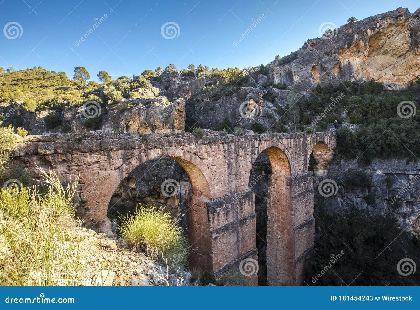 beautiful view of the pena cortada bridge among the mountains captured in chelva, valencia, spain