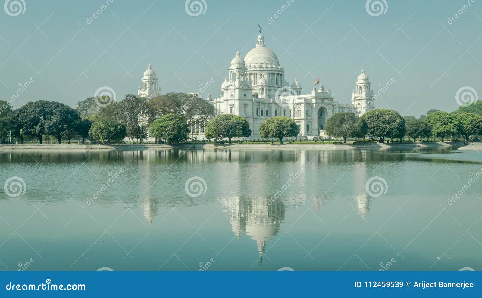 a beautiful view of victoria memorial with reflection on water, kolkata, calcutta, west bengal, india