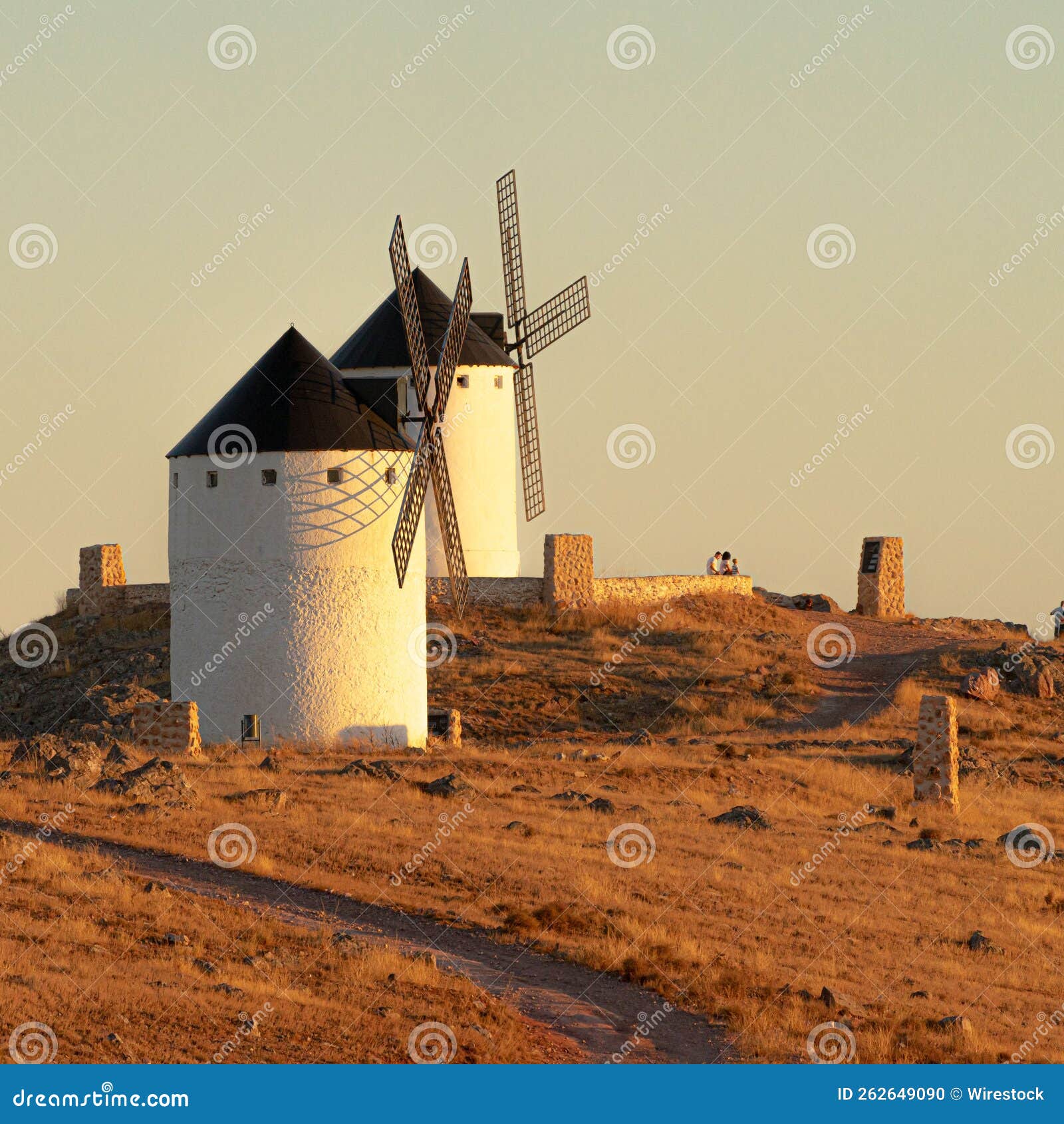 beautiful view of windmills on a hill in herencia, ciudad real, spain
