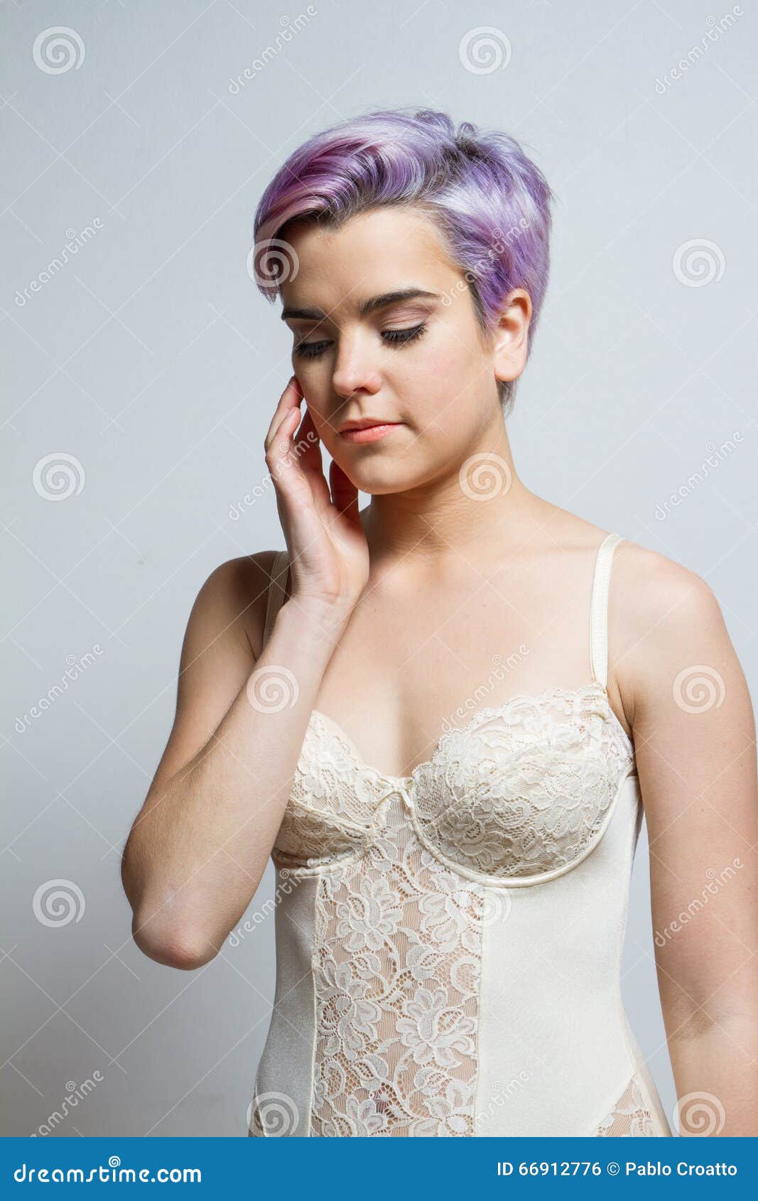 Beautiful Violet Short Haired Girl With Closed Eyes Indoors Stock
