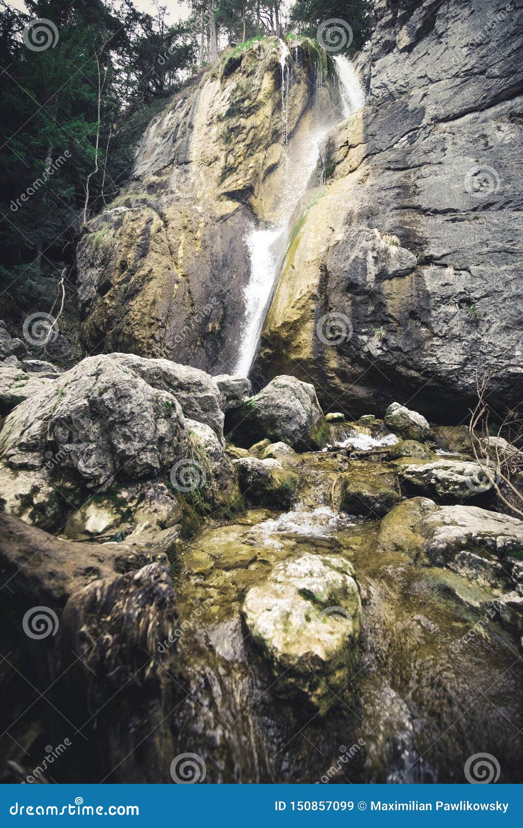 Beautiful Waterfall With Trees Red Leaves Rocks And Stones In Autumn