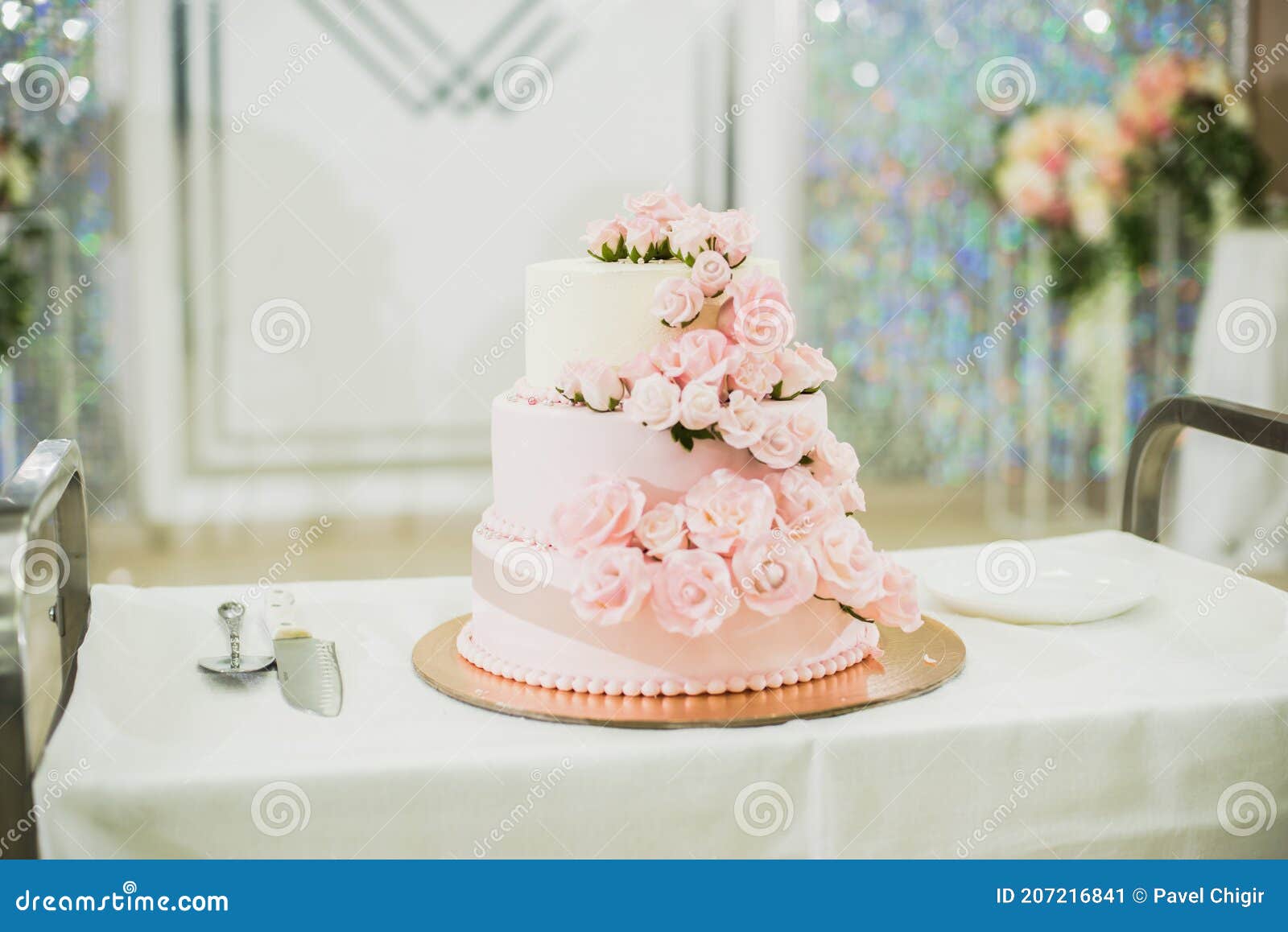 Beautiful Wedding Cake Bride and Groom Cut into Pieces Stock Image