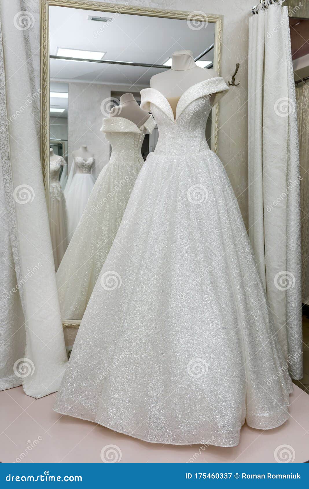 Beautiful Wedding Dress on a Mannequin in Salon Stock Image ...