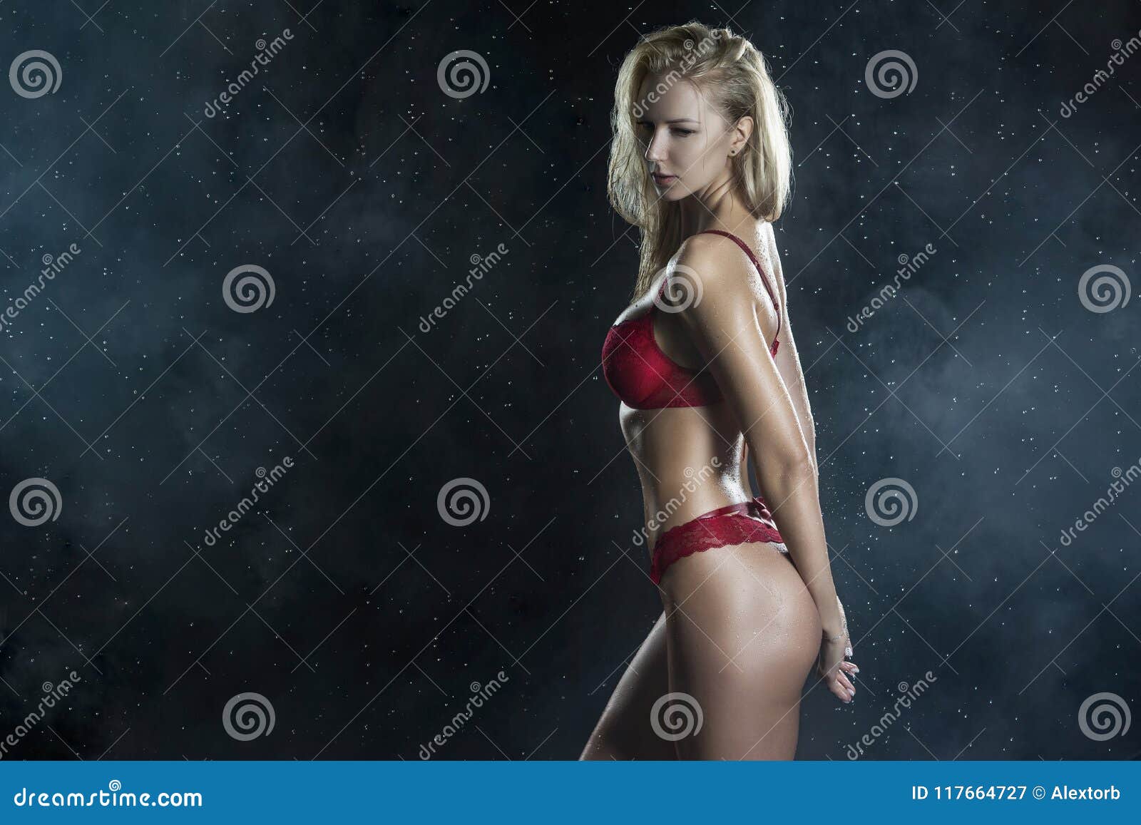 Beautiful Wet Sporty Big Tits Tanned Blonde Girl Wearing Red Underwear  Posing Sideways in Scenic Smoke and Fog Under Falling Stock Image - Image  of lady, fitness: 117664727