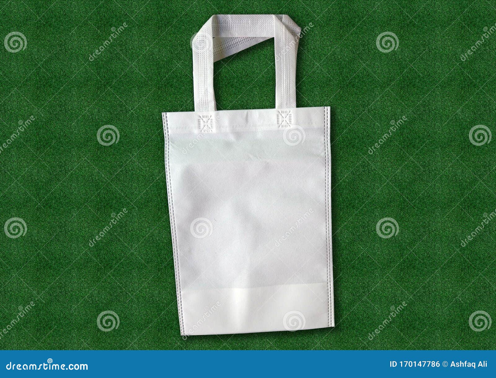 Download Beautiful White Non Woven Eco Friendly Bag On Grass ...