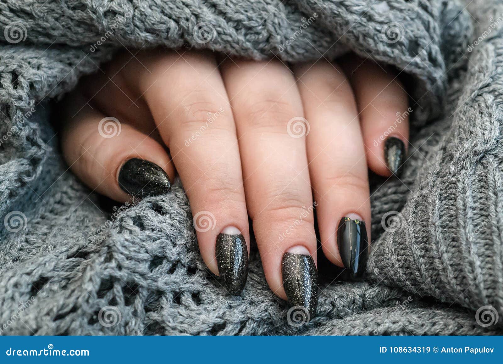 Beautiful Winter Manicure. Black Lacquer with Luster and White Patterns ...