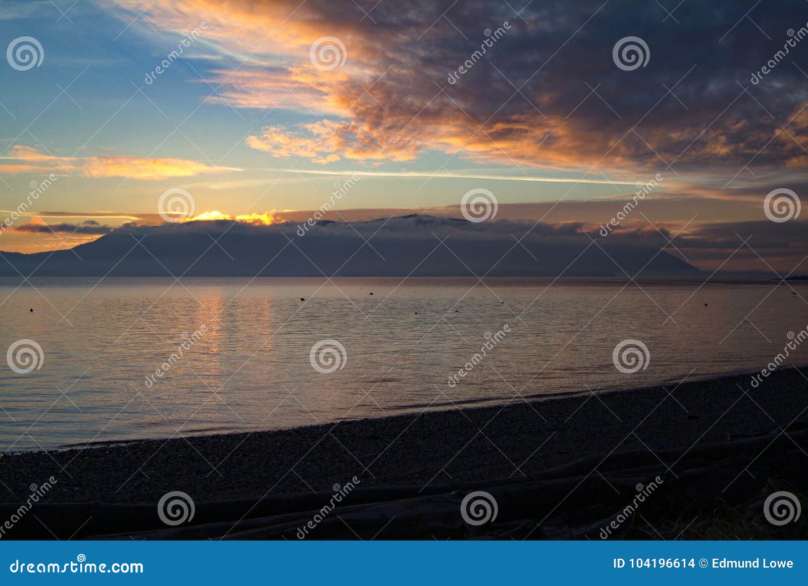 dramatic sky and sunset over orcas island, washington, usa.