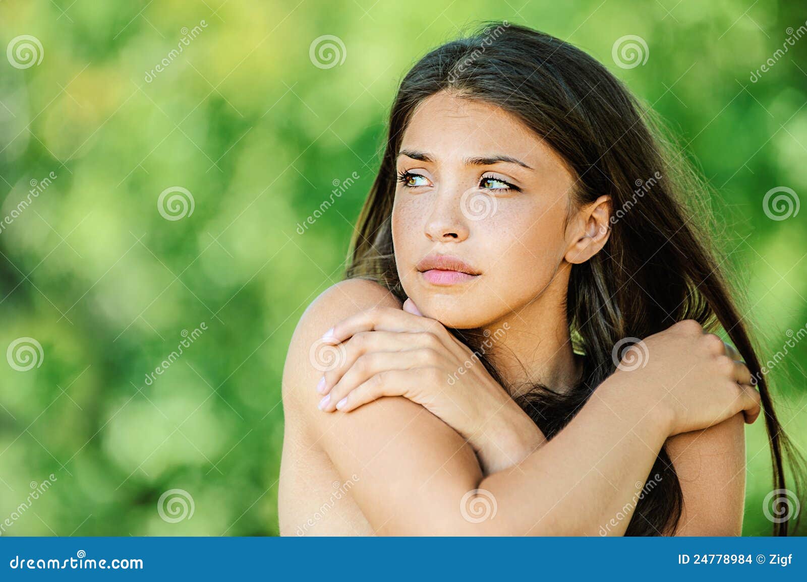 woman with bare shoulders in nature Stock Photo