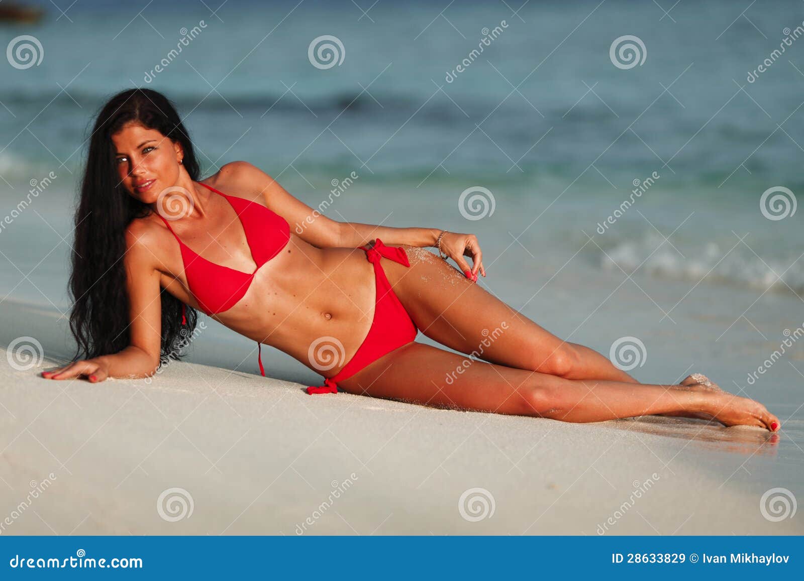 Beautiful woman on beach stock image pic
