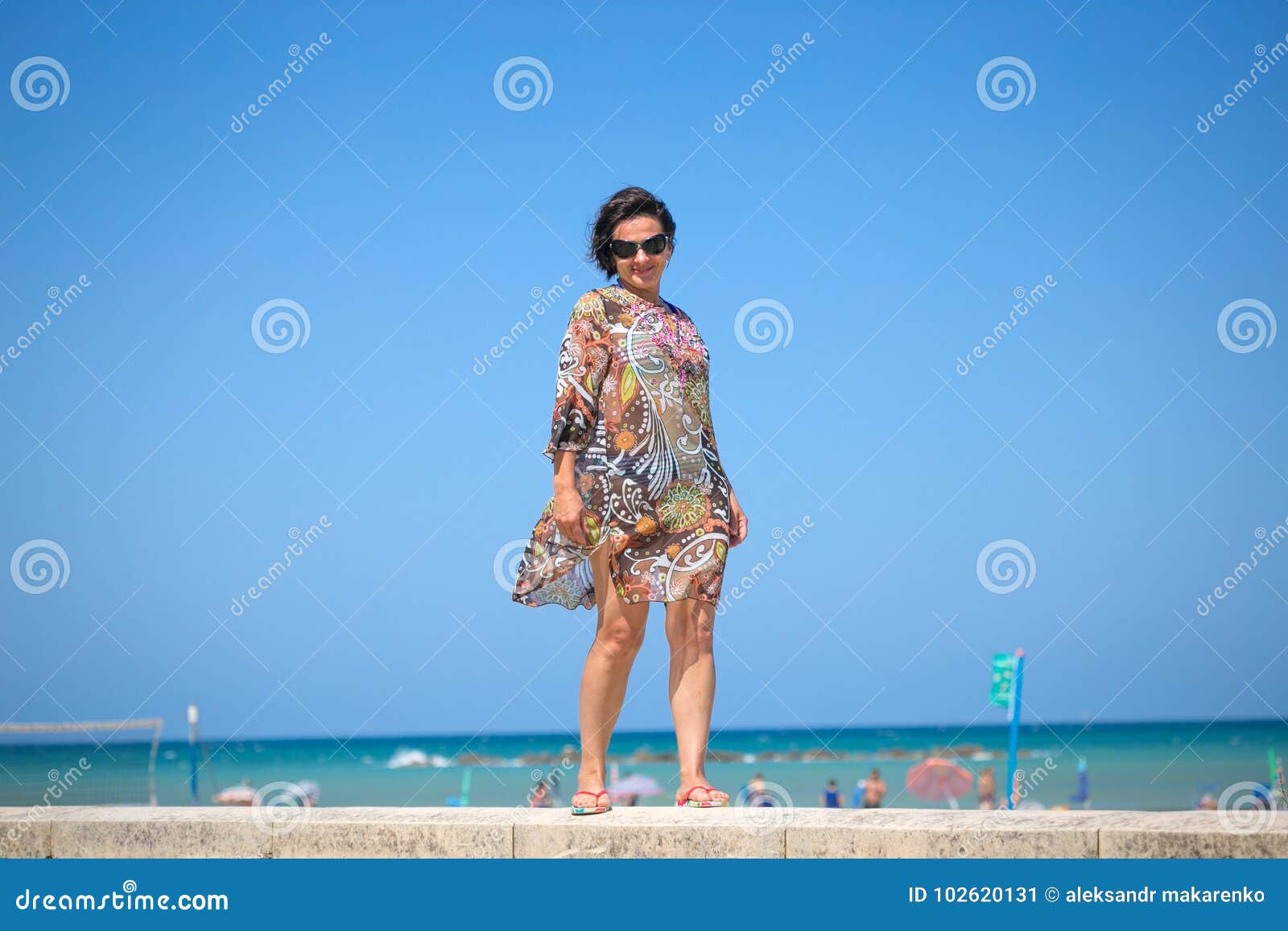 Beautiful Woman on the Beach in the Wind. Stock Image - Image of girl ...