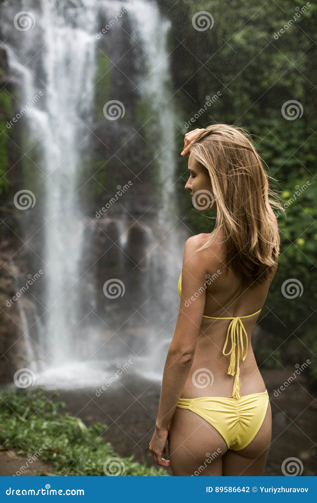 Beautiful Woman Pay Respect To Waterfall Stock Image 