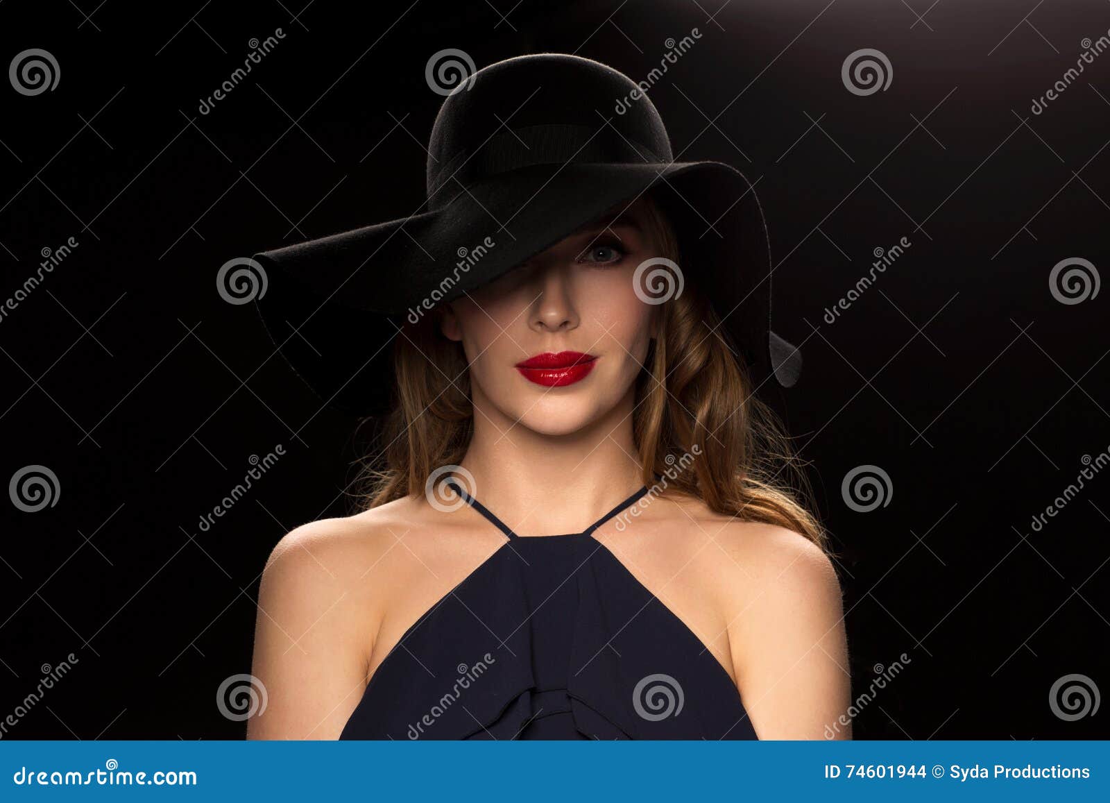 Beautiful Woman in Black Hat Over Dark Background Stock Photo - Image ...