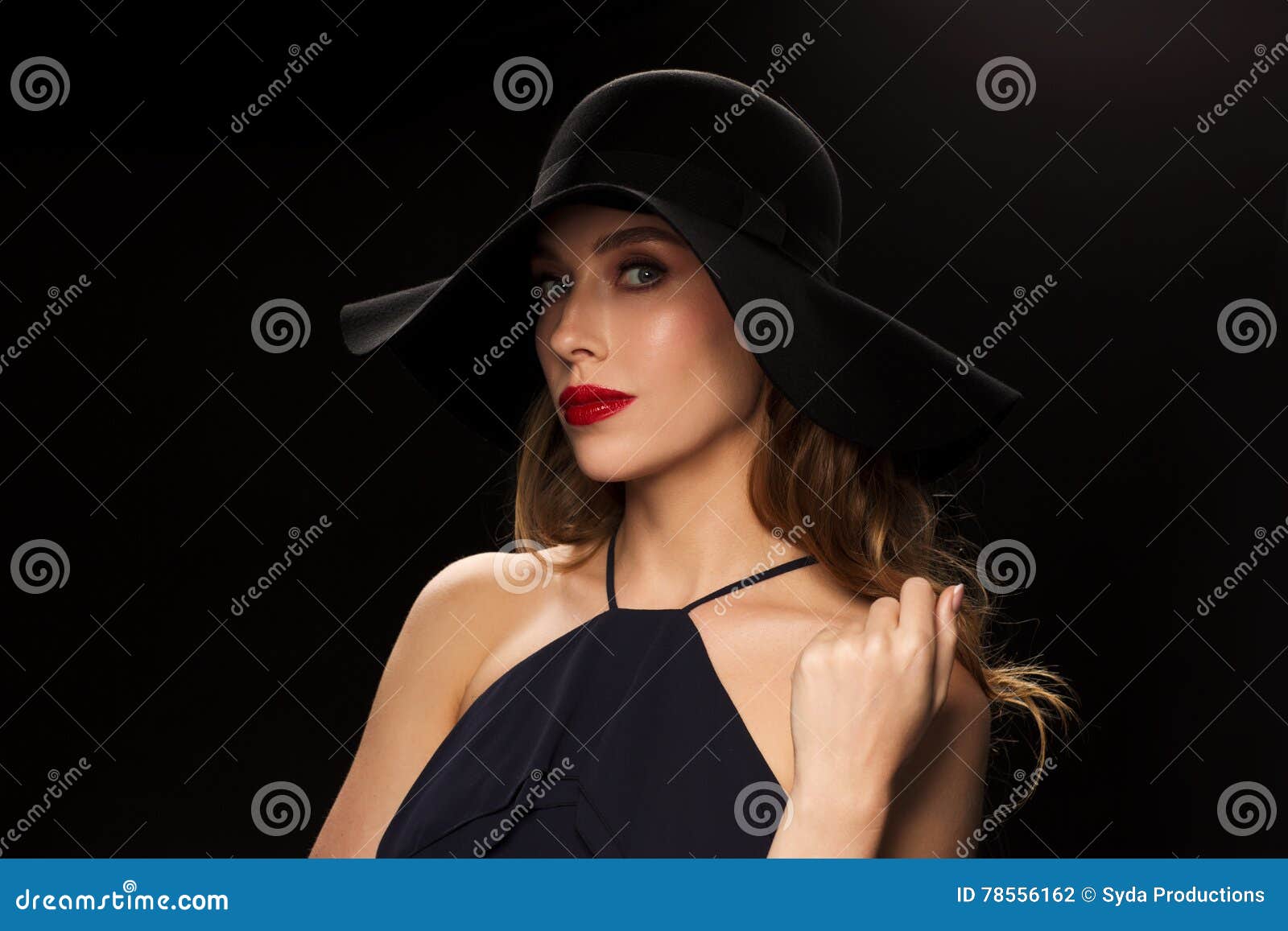 Beautiful Woman in Black Hat Over Dark Background Stock Photo - Image ...