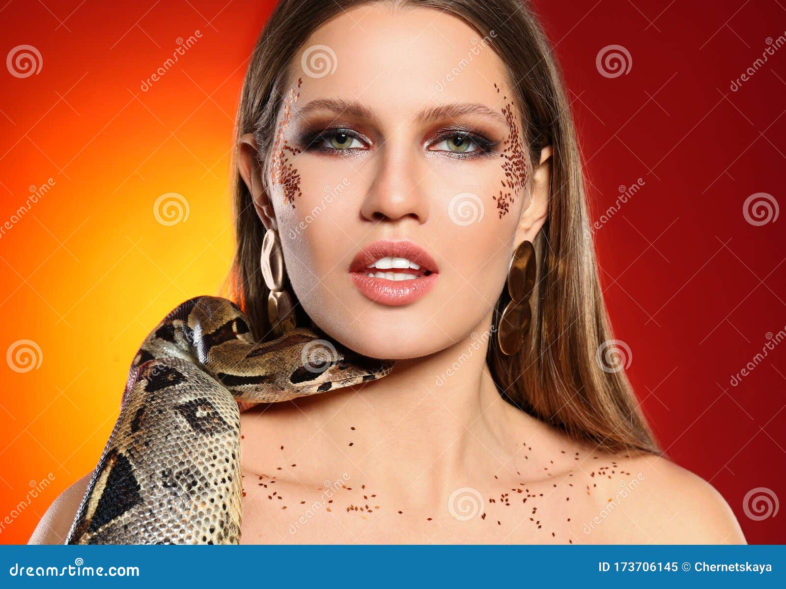 Beautiful Woman with Boa Constrictor on Bright Colorful Background ...