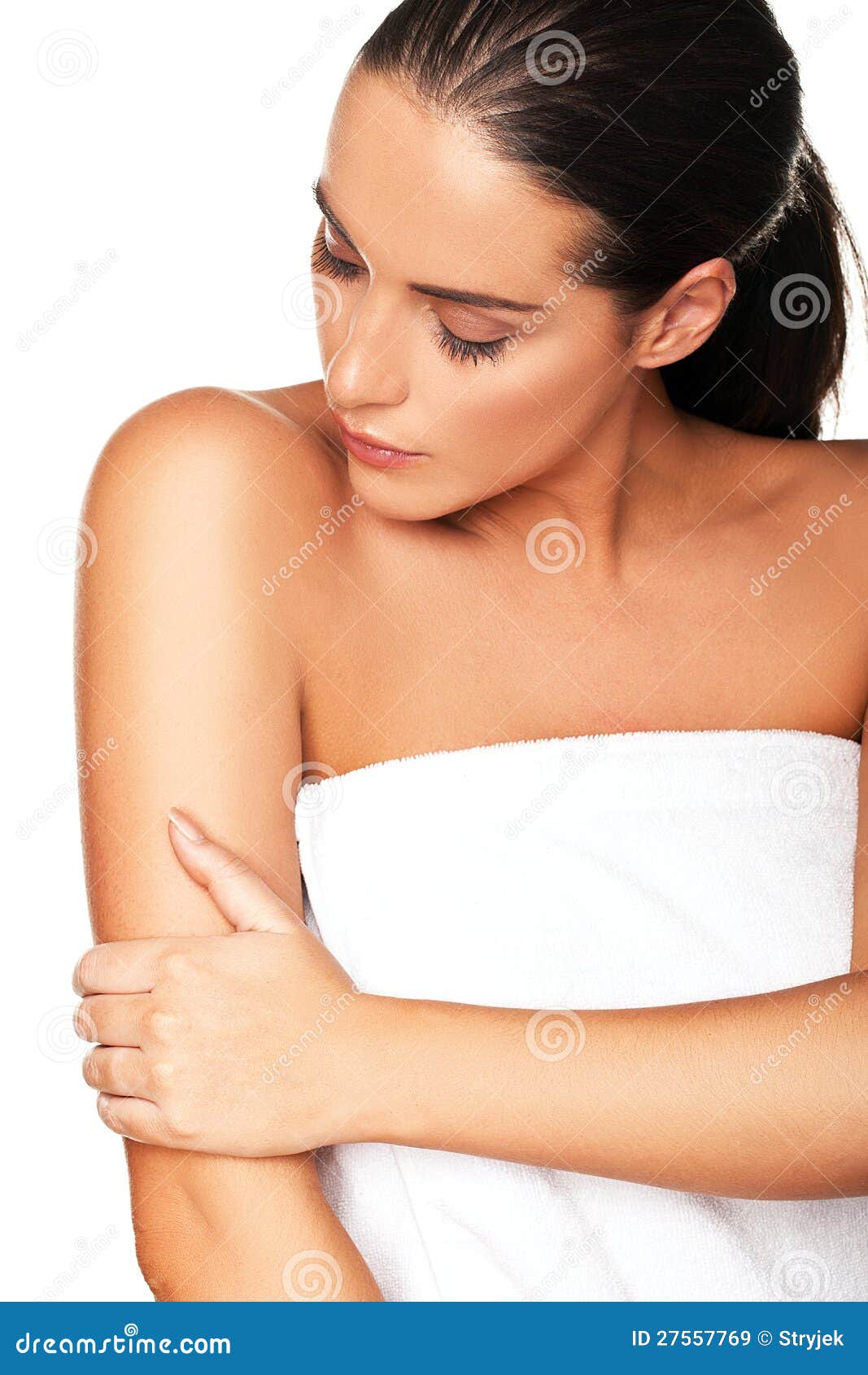 beautiful woman caressing her arm
