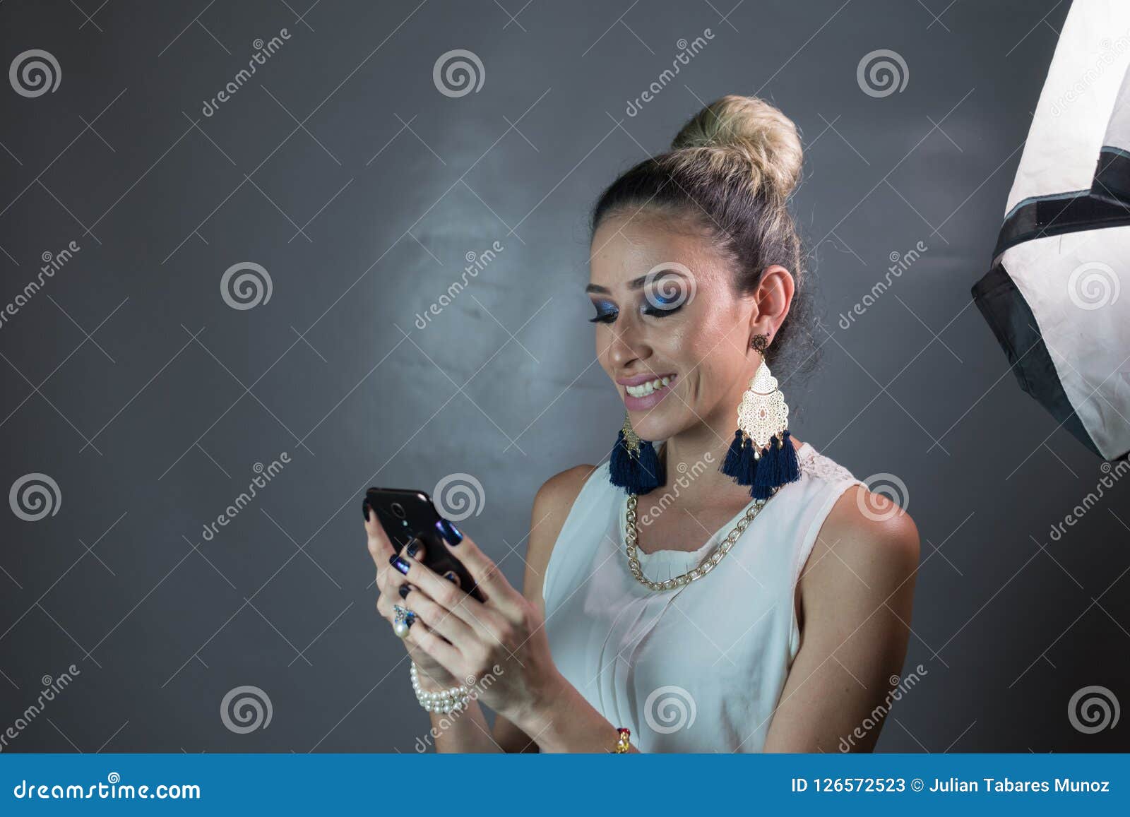 a beautiful woman chatting on a cell phone